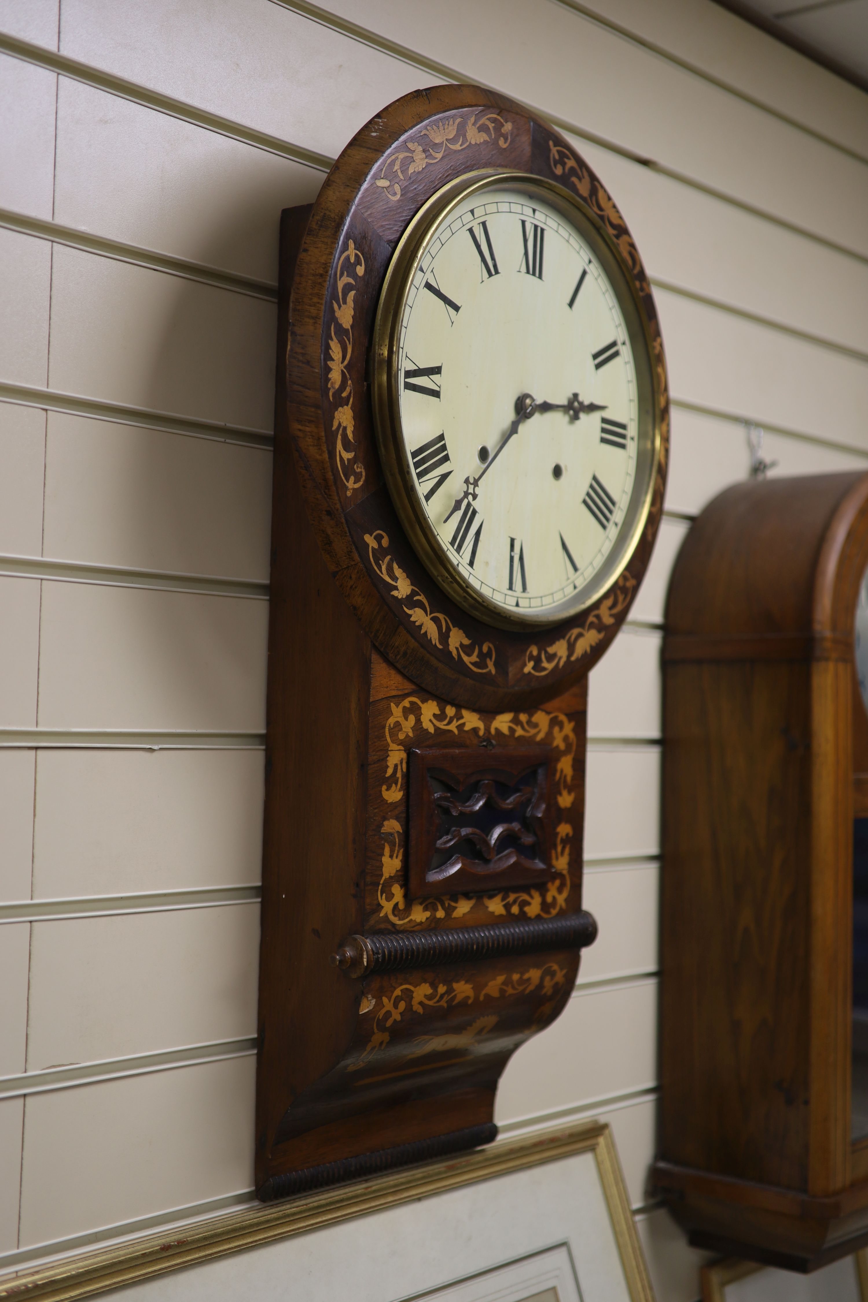 A Victorian inlaid rosewood wall clock